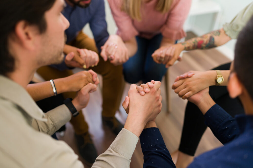 people holding hands at benzodiazepine addiction treatment in georgia