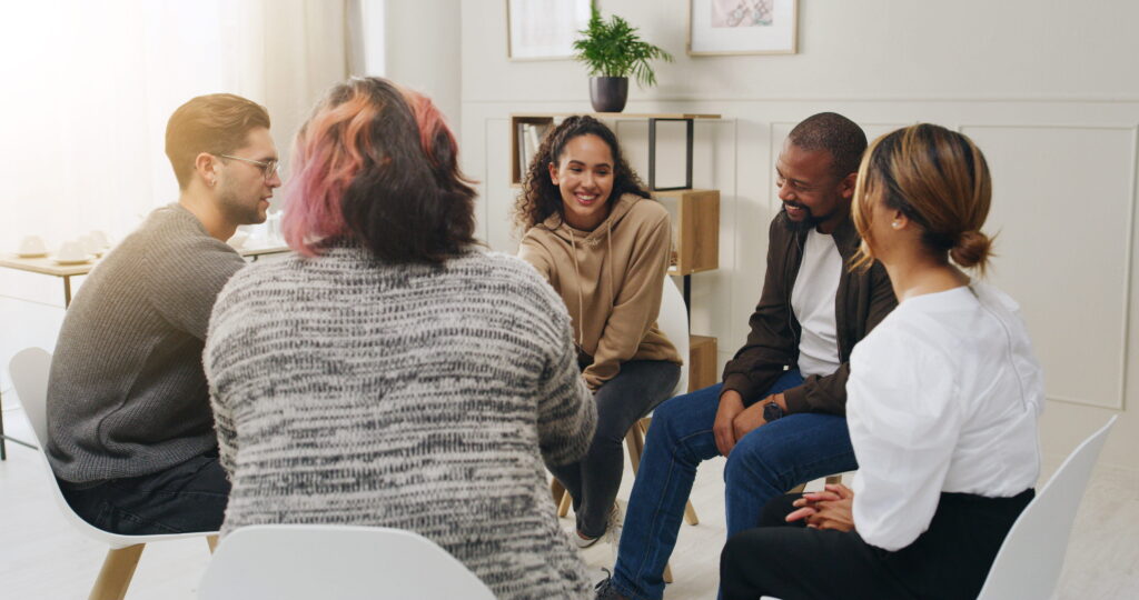 People enjoy a group therapy session during evening IOP in Alpharetta, GA.