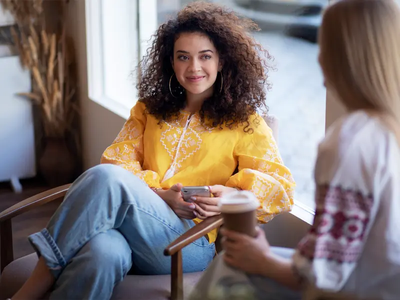 client with a female therapist learning about the the importance of trauma informed treatment