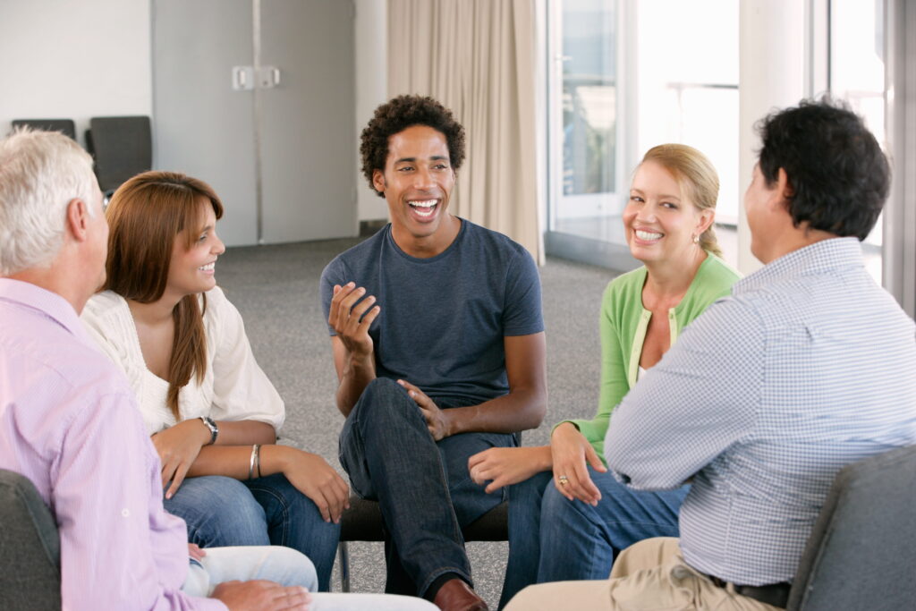 People share their experiences during a a group therapy exercise at our rehab in Forsyth County.