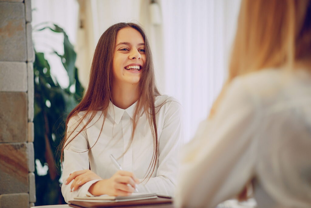 A woman asks about affordable BCBS Rehab in Alpharetta, GA during a consultation.